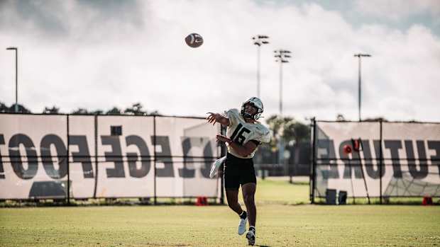 Mikey Keene Throwing Pass at Practice